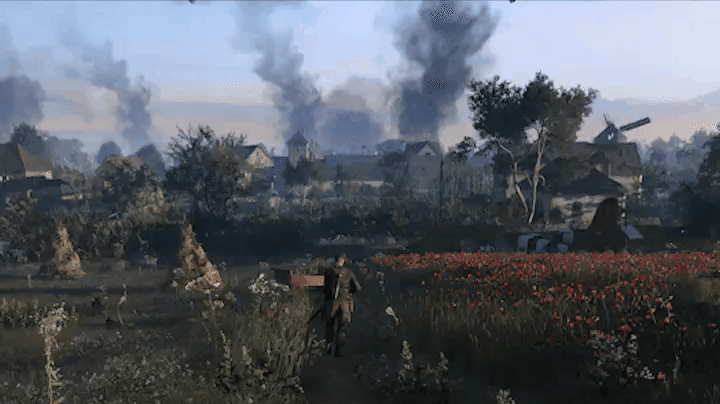 Gif animation. Grassy field in Sniper Elite 5. In the middle is a path and Karl walks away from the camera. Few aircraft fly away above and a large text “Sniper Elite 5 - Coming 2022” shows on the screen.