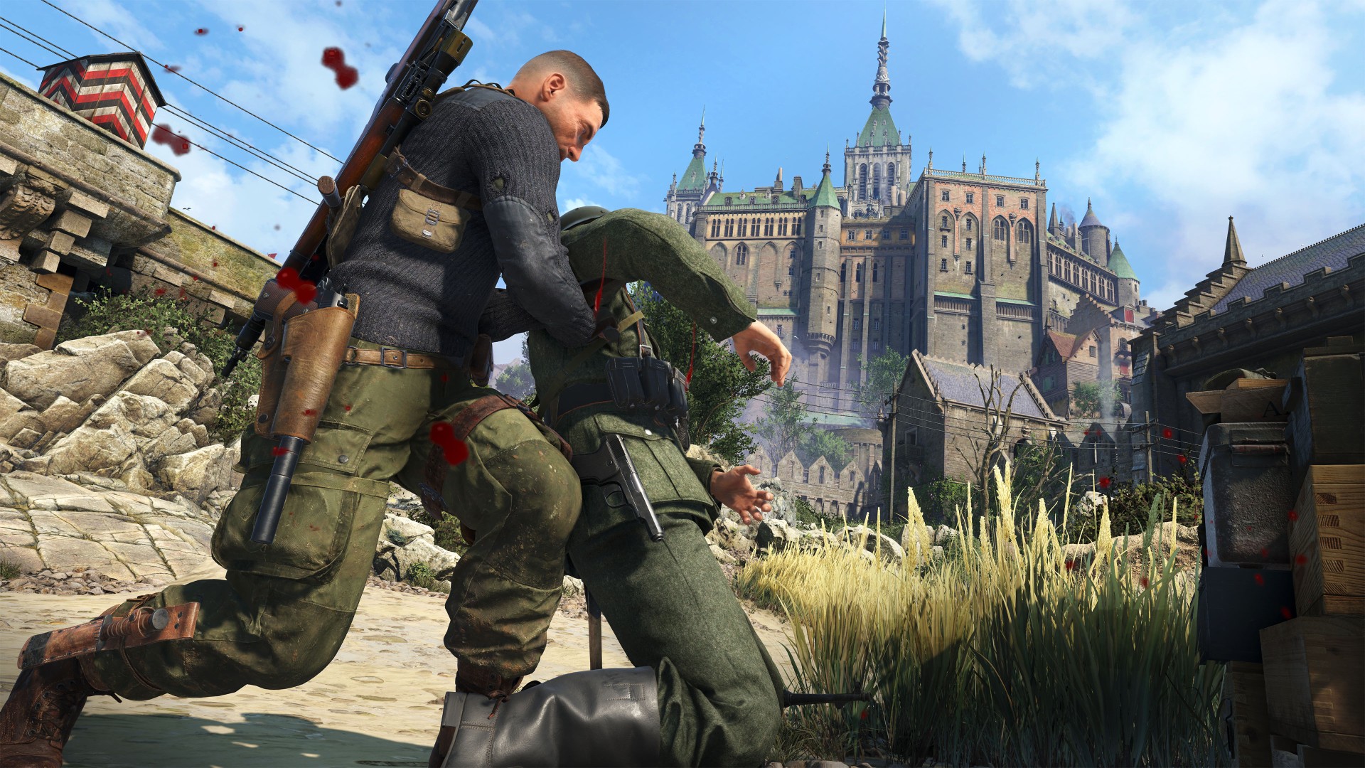Sniper Elite 5 screenshot. Showcasing Karl Fairburne fighting an enemy soldier. In the background is the large castle Beaumont-Saint-Denis, or level “Spy Academy” in the game. It’s visuals are inspired by Mont-Saint-Michel Abbey.
